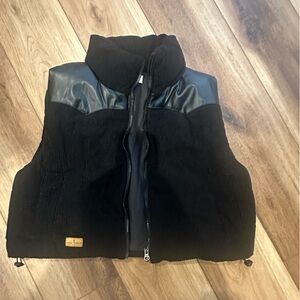 Black corduroy vest with leather accent